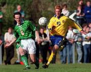 27 April 1999; Andrew O'Brien of Republic of Ireland in action against Patric Andersson of Swden during the U21 International friendly match between Republic of Ireland and Sweden at Birr Town FC in Birr, Offaly. Photo By Brendan Moran/Sportsfile
