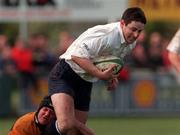 27 April 1999; Brian O'Meara of Cork Constitution is tackled by Martyn Steffert of Buccaneers during the AIB All-Ireland League Division 1 Semi-Final match between Cork Constitution and Buccaneers at Temple Hill in Cork. Photo by Matt Browne/Sportsfile