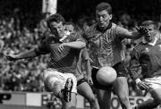 23 April 1989; Jimmy Kerrigan of Cork in action against Eamonn Henry of Dublin during the Royal Liver National Football League Final match between Cork and Dubin at Croke Park in Dublin Photo by Ray McManus/Sportsfile