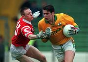 25 April 1999; Cormac Sullivan of Meath in action against Phillip Clifford of Cork during the Church & General National Football League Division 1 Semi-Final match between Cork and Meath at Croke Park in Dublin. Photo by Ray McManus/Sportsfile