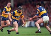 2 May 1999; David Forde of Clare in action against Raymie Ryan of Tipperary during the Church & General National Hurling League Division 1 Semi-Final match between Clare and Tipperary at the Gaelic Grounds in Limerick. Photo by Ray McManus/Sportsfile