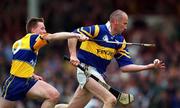 2 May 1999; Declan Carr of Tipperary in action against Jamesie O'Connor of Clare during the Church & General National Hurling League Division 1 Semi-Final match between Clare and Tipperary at the Gaelic Grounds in Limerick. Photo by Ray McManus/Sportsfile