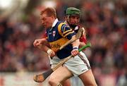 16 May 1999; Declan Ryan of Tipperary in action against Fergus Flynn of Galway during the Church & General National Hurling League Division 1 Final match between Galway and Tipperary at Cusack Park in Ennis, Clare. Photo By Brendan Moran/Sportsfile