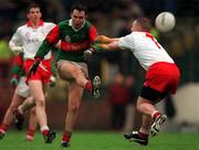 9 May 1999; Demetri Doherty of Mayo in action against Eoin Bradley of Tyrone during the All-Ireland Vocational Schools' Intercounty Football Final match between Mayo and Tyrone at Páirc U’ Chaoimh in Cork. Photo by Ray McManus/Sportsfile