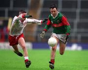 9 May 1999; Demetri Doherty of Mayo in action against Niall Quinn of Tyrone during the All-Ireland Vocational Schools' Intercounty Football Final match between Mayo and Tyrone at Páirc U’ Chaoimh in Cork. Photo by Aoife Rice/Sportsfile