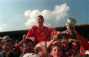 17 May 1998; Diarmuid O'Sullivan of Cork celebrates with the cup and supporters following the Church & General National Hurling League Final between Cork and Waterford at Semple Stadium in Thurles, Tipperary. Photo by Ray McManus/Sportsfile