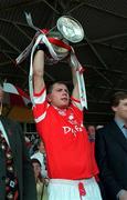 17 May 1998; Diarmuid O'Sullivan of Cork lifts the cup following the Church & General National Hurling League Final between Cork and Waterford at Semple Stadium in Thurles, Tipperary. Photo by Ray McManus/Sportsfile