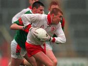 9 May 1999; Owen Mulligan of Tyrone in action against John Duffy of Mayo during the All-Ireland Vocational Schools' Intercounty Football Final match between Mayo and Tyrone at Páirc U’ Chaoimh in Cork. Photo by Ray McManus/Sportsfile