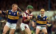 16 May 1999; Fergus Flynn of Galway in action against Declan Ryan of Tipperary during the Church & General National Hurling League Division 1 Final match between Galway and Tipperary at Cusack Park in Ennis, Clare. Photo by Ray McManus/Sportsfile