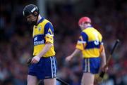 2 May 1999; Frank Lohan of Clare, left, with his brother Brian Lohan in the background during the Church & General National Hurling League Division 1 Semi-Final match between Clare and Tipperary at the Gaelic Grounds in Limerick. Photo by Ray McManus/Sportsfile