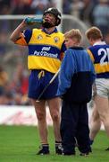 2 May 1999; Conor Loughnane, son of Clare hurling manager Ger Loughnane, waits as Frank Lohan of Clare takes a drink during the Church & General National Hurling League Division 1 Semi-Final match between Clare and Tipperary at the Gaelic Grounds in Limerick. Photo by Ray McManus/Sportsfile