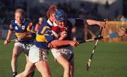 28 August 1997; Kevin Broderick of Galway in action against George Frend of Tipperary during the Church & General National Hurling League Semi-Final match between Galway and Tipperary at Cusack Park in Ennis, Clare Photo by David Maher/Sportsfile
