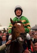 30 April 1999; Istabraq with Charlie Swan up, enter the winners enclosure after winning the Shell Champion Hurdle at Punchestown racecourse in Kildare. Photo by Matt Browne/Sportsfile