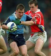 9 May 1999; Jim Gavin of Dublin is tackled by Ciaran O'Sullivan of Cork during the Church & General National Football League Final between Cork and Dublin at Páirc Uí Chaoimh in Cork. Photo by Ray McManus/Sportsfile