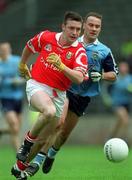 9 May 1999; Joe Kavanagh of Cork in action against Paul Curran of Dublin during the Church & General National Football League Final between Cork and Dublin at Páirc U’ Chaoimh in Cork. Photo by Ray McManus/Sportsfile