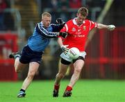 9 May 1999; Nicholas Murphy of Cork is tackled by Declan Darcy of Dublin during the Church & General National Football League Final between Cork and Dublin at Páirc U’ Chaoimh in Cork. Photo by Ray McManus/Sportsfile