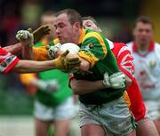 25 April 1999; Ollie Murphy of Meath in action against Ronan McCarthy of Cork during the Church & General National Football League Division 1 Semi-Final match between Cork and Meath at Croke Park in Dublin. Photo by Ray McManus/Sportsfile
