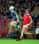 9 May 1999; Paddy Morgan of Dublin in action against Alan O'Regan of Cork during the Church & General National Football League Final between Cork and Dublin at Páirc U’ Chaoimh in Cork. Photo by Ray McManus/Sportsfile