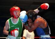 30 April 1999; Paul McCloskey of Ireland, in action against Michael Yikealo of Sweden during an International Boxing event between Ireland and Sweden at the National Stadium in Dublin. Photo by Ray Lohan/Sportsfile