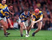 2 May 1999; Brian O'Meara, left, and Paul Shelly, centre, of Tipperary, in action against Brian Lohan of Clare during the Church & General National Hurling League Division 1 Semi-Final match between Clare and Tipperary at the Gaelic Grounds in Limerick. Photo by Ray McManus/Sportsfile