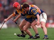 2 May 1999; Paul Shelly of Tipperary in action against Brian Lohan of Clare during the Church & General National Hurling League Division 1 Semi-Final match between Clare and Tipperary at the Gaelic Grounds in Limerick. Photo by Ray McManus/Sportsfile