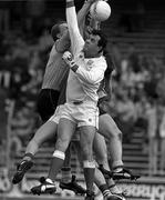 23 April 1989; John Kerins of Cork in action against Barney Rock of Dublin during the Royal Liver National Football League Final match between Cork and Dubin at Croke Park in Dublin Photo by Ray McManus/Sportsfile