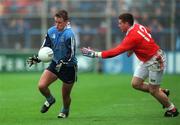 25 April 1999; Keith Galvin of Dublin in action against Diarmuid Marsden of Armagh during the Church & General National Football League Division 1 Semi-Final match between Armagh and Dublin at Croke Park in Dublin. Photo by Damien Eagers/Sportsfile