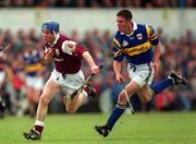 16 May 1999; Kevin Broderick of Galway in action against Brian Horgan of Tipperary during the Church & General National Hurling League Division 1 Final match between Galway and Tipperary at Cusack Park in Ennis, Clare. Photo By Brendan Moran/Sportsfile