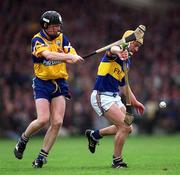 2 May 1999; Liam Cahill of Tipperay in action against Frank Lohan of Clare during the Church & General National Hurling League Division 1 Semi-Final match between Clare and Tipperary at the Gaelic Grounds in Limerick. Photo by Damien Eagers/Sportsfile
