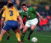 28 April 1999; Mark Kennedy of Republic of Ireland in action against Patrick Andersson of Sweden, 3, during the International friendly match between Republic of Ireland and Sweden at Lansdowne Road in Dublin. Photo by David Maher/Sportsfile