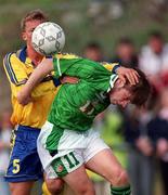 27 April 1999; Mark McKeever of Republic of Ireland in action against Erik Edman of Sweden during the U21 International friendly match between Republic of Ireland and Sweden at Birr Town FC in Birr, Offaly. Photo By Brendan Moran/Sportsfile