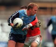 25 April 1999; Shane Ryan of Dublin is tackled by Diarmuid Marsden of Armagh during the Church & General National Football League Division 1 Semi-Final match between Armagh and Dublin at Croke Park in Dublin. Photo by Ray McManus/Sportsfile