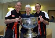 26 September 2005; Tyrone manager Mickey Harte, left, and captain Brian Dooher with Chaplain, Sr. Barbara Falls, from Washing Bay, Coalisland, Co. Tyrone, with the Sam Maguire cup at Our Lady's Hospital for Sick Children, Crumlin, Dublin. Picture credit; Damien Eagers/ SPORTSFILE