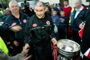 26 September 2005; Tyrone manager Mickey Harte with the Sam Maguire cup at the victorious Tyrone team's homecoming. Aughnacloy, Co. Tyrone. Picture credit; Oliver McVeigh / SPORTSFILE