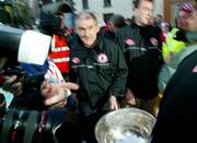 26 September 2005; Tyrone manager Mickey Harte with the Sam Maguire cup at the victorious Tyrone team's homecoming. Aughnacloy, Co. Tyrone. Picture credit; Oliver McVeigh / SPORTSFILE