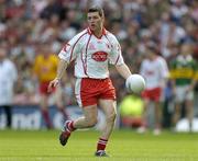 25 September 2005; Conor Gormley, Tyrone. Bank of Ireland All-Ireland Senior Football Championship Final, Kerry v Tyrone, Croke Park, Dublin. Picture credit; Brendan Moran / SPORTSFILE *** Local Caption *** Any photograph taken by SPORTSFILE during, or in connection with, the 2005 Bank of Ireland All-Ireland Senior Football Final which displays GAA logos or contains an image or part of an image of any GAA intellectual property, or, which contains images of a GAA player/players in their playing uniforms, may only be used for editorial and non-advertising purposes.  Use of photographs for advertising, as posters or for purchase separately is strictly prohibited unless prior written approval has been obtained from the Gaelic Athletic Association.
