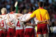 25 September 2005; Tyrone players from left Owen Mulligan, Enda McGinley, Michael McGee, Davy Harte and goalkeeper Pascal McConnell stand for the national anthem Amhran na bhFiann. Bank of Ireland All-Ireland Senior Football Championship Final, Kerry v Tyrone, Croke Park, Dublin. Picture credit; Damien Eagers/ SPORTSFILE *** Local Caption *** Any photograph taken by SPORTSFILE during, or in connection with, the 2005 Bank of Ireland All-Ireland Senior Football Final which displays GAA logos or contains an image or part of an image of any GAA intellectual property, or, which contains images of a GAA player/players in their playing uniforms, may only be used for editorial and non-advertising purposes.  Use of photographs for advertising, as posters or for purchase separately is strictly prohibited unless prior written approval has been obtained from the Gaelic Athletic Association.