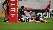17 March 2014; Cormac Blake, Crescent College, scores his side's firs try despite the efforts of Joe Cannon, left, and Brion Moriarty, Ard Scoil Ris. SEAT Munster Schools Senior Cup Final, Ard Scoil Ris v Crescent College, Thomond Park, Limerick. Picture credit: Diarmuid Greene / SPORTSFILE