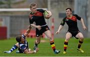 17 March 2014; Paul McNamara, Ardscoil Ris, supported by team-mate Liam Brock, is tackled by Fionn McGibney, Crescent College. SEAT Munster Schools Senior Cup Final, Ard Scoil Ris v Crescent College Comprehensive, Thomond Park, Limerick. Picture credit: Diarmuid Greene / SPORTSFILE