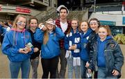17 March 2014; Dublin star Michael Darragh Macauley with St Vincent's supporters Aoife Trainor, Cassie Paisley, Caoimhe Woods, Niamh Hettherton, Lucy Lynch, Ciara Lambe and Clare Clinton at the AIB GAA Club Finals Funzone, Croke Park, Dublin. Picture credit: Ray McManus / SPORTSFILE