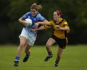 26 September 2005; Maura Guiney, North America, in action against Louise Kelly, Britain. International Ladies Football Tournament 2005, North America v Britain, Naomh Mearnog, Portmarnock, Dublin. Picture credit; Pat Murphy / SPORTSFILE