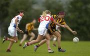 26 September 2005; Catherine Hennessy, Europe, in action during against Marie Cassels, 20, and Karen Henry, New York. International Ladies Football Tournament 2005, New York v Europe, Naomh Mearnog, Portmarnock, Dublin. Picture credit; Pat Murphy / SPORTSFILE