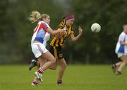 26 September 2005; Catherine Hennessy, Europe, in action against Marie Cassels, New York. International Ladies Football Tournament 2005, New York v Europe, Naomh Mearnog, Portmarnock, Dublin. Picture credit; Pat Murphy / SPORTSFILE