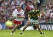 25 September 2005; Ryan McMenamin, Tyrone, in action against Declan O'Sullivan, Kerry. Bank of Ireland All-Ireland Senior Football Championship Final, Kerry v Tyrone, Croke Park, Dublin. Picture credit; Brendan Moran / SPORTSFILE *** Local Caption *** Any photograph taken by SPORTSFILE during, or in connection with, the 2005 Bank of Ireland All-Ireland Senior Football Final which displays GAA logos or contains an image or part of an image of any GAA intellectual property, or, which contains images of a GAA player/players in their playing uniforms, may only be used for editorial and non-advertising purposes.  Use of photographs for advertising, as posters or for purchase separately is strictly prohibited unless prior written approval has been obtained from the Gaelic Athletic Association.