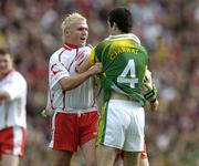 25 September 2005; Owen Mulligan, Tyrone, confronts Tom O'Sullivan, Kerry. Bank of Ireland All-Ireland Senior Football Championship Final, Kerry v Tyrone, Croke Park, Dublin. Picture credit; Brendan Moran / SPORTSFILE *** Local Caption *** Any photograph taken by SPORTSFILE during, or in connection with, the 2005 Bank of Ireland All-Ireland Senior Football Final which displays GAA logos or contains an image or part of an image of any GAA intellectual property, or, which contains images of a GAA player/players in their playing uniforms, may only be used for editorial and non-advertising purposes.  Use of photographs for advertising, as posters or for purchase separately is strictly prohibited unless prior written approval has been obtained from the Gaelic Athletic Association.