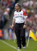 25 September 2005; Mickey Harte, Tyrone manager. Bank of Ireland All-Ireland Senior Football Championship Final, Kerry v Tyrone, Croke Park, Dublin. Picture credit; Brendan Moran / SPORTSFILE *** Local Caption *** Any photograph taken by SPORTSFILE during, or in connection with, the 2005 Bank of Ireland All-Ireland Senior Football Final which displays GAA logos or contains an image or part of an image of any GAA intellectual property, or, which contains images of a GAA player/players in their playing uniforms, may only be used for editorial and non-advertising purposes.  Use of photographs for advertising, as posters or for purchase separately is strictly prohibited unless prior written approval has been obtained from the Gaelic Athletic Association.