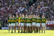 25 September 2005; The Kerry team stand together for the national anthem before the game. Bank of Ireland All-Ireland Senior Football Championship Final, Kerry v Tyrone, Croke Park, Dublin. Picture credit; Brendan Moran / SPORTSFILE *** Local Caption *** Any photograph taken by SPORTSFILE during, or in connection with, the 2005 Bank of Ireland All-Ireland Senior Football Final which displays GAA logos or contains an image or part of an image of any GAA intellectual property, or, which contains images of a GAA player/players in their playing uniforms, may only be used for editorial and non-advertising purposes.  Use of photographs for advertising, as posters or for purchase separately is strictly prohibited unless prior written approval has been obtained from the Gaelic Athletic Association.