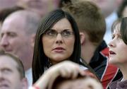 25 September 2005; Michaela Harte, daughter of Tyrone manager Mickey Harte, watches the game from the stands. Bank of Ireland All-Ireland Senior Football Championship Final, Kerry v Tyrone, Croke Park, Dublin. Picture credit; Brendan Moran / SPORTSFILE *** Local Caption *** Any photograph taken by SPORTSFILE during, or in connection with, the 2005 Bank of Ireland All-Ireland Senior Football Final which displays GAA logos or contains an image or part of an image of any GAA intellectual property, or, which contains images of a GAA player/players in their playing uniforms, may only be used for editorial and non-advertising purposes.  Use of photographs for advertising, as posters or for purchase separately is strictly prohibited unless prior written approval has been obtained from the Gaelic Athletic Association.