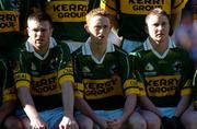 25 September 2005; Kerry's Tomas O Se, Colm Cooper, and Mike Frank Russell pose for the team photograph. Bank of Ireland All-Ireland Senior Football Championship Final, Kerry v Tyrone, Croke Park, Dublin. Picture credit; Damien Eagers/ SPORTSFILE *** Local Caption *** Any photograph taken by SPORTSFILE during, or in connection with, the 2005 Bank of Ireland All-Ireland Senior Football Final which displays GAA logos or contains an image or part of an image of any GAA intellectual property, or, which contains images of a GAA player/players in their playing uniforms, may only be used for editorial and non-advertising purposes.  Use of photographs for advertising, as posters or for purchase separately is strictly prohibited unless prior written approval has been obtained from the Gaelic Athletic Association.
