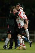 30 September 2005; Stephen O'Flynn, centre, Derry City, celebrates after scoring his sides second and winning goal with team-mates Pat McCourt, left and Gareth McGlynn. eircom league, Premier Division, Derry City v Shelbourne, Brandywell, Derry. Picture credit: David Maher / SPORTSFILE